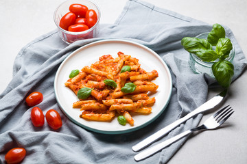 Penne pasta with tomato sauce.