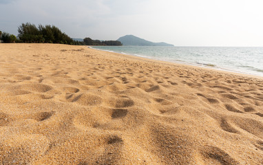 father and son walking in happy moment on Mai Khao beach, Talang, Phuket in Sunset time