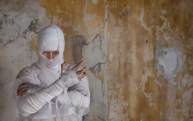 Halloween image, mummy in bandages, risen dead legendary character.