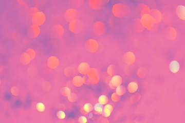 Pink-purple abstract bokeh background. Beautiful sparkling color festive texture.