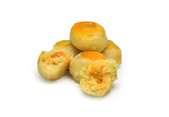 Chinese pastry or moon cake filled with mung bean paste and salted egg yolk isolated on white background. Clipping path