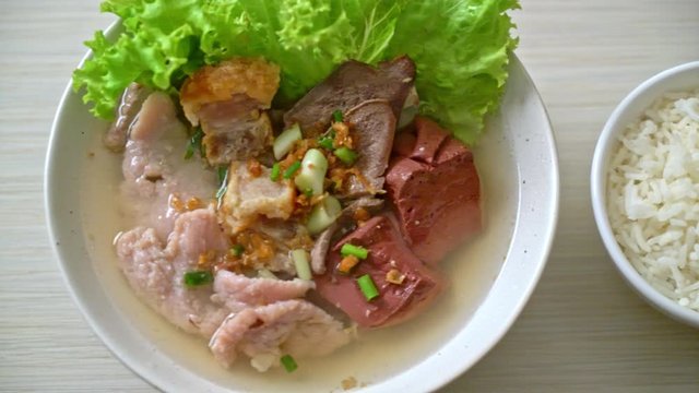 pork's entrails and blood jelly soup bowl with rice - Asian food style