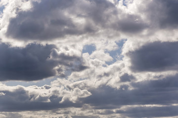 Fototapeta premium dark Blue sky background with tiny stratus cirrus striped clouds. Clearing evening and Good windy weather