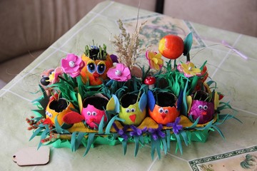 easter eggs and flowers in basket