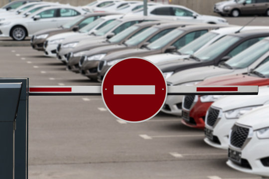 A barrier with a prohibition sign. A symbol of the crisis in the automotive industry