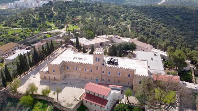 Flying over the church in the monastery Beit Jamal and valley from the sky