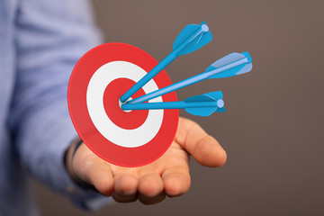 dart target arrow hitting on bullseye which is the ultimate goal that everyone wants.