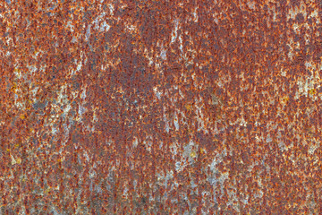 Rusty metal surface. Grunge metallic texture background with scratches and cracks.