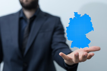 3D map of Germany. Map of Germany land border with flag. Germany map on white background. 3d rendering.