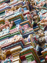 Colorful Daylight view of indian gods sculpture at Sri Maha Mariamman Temple.