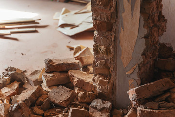 Part of a destroyed brick wall. Renovation of the house demolition transfer of walls. Expansion of...