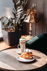 Banana croissant and coffee. Cafe.