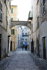 Finalborgo (SV), Italy - December 12, 2017: A typical house and pathway in Finalborgo village, Finale Ligure, Liguria, Italy