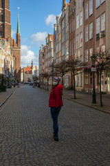 Woman in mask in Gdansk, Poland during corona virus outbreak (COVID-19) Europe 