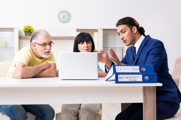 Financial advisor giving retirement advice to old couple