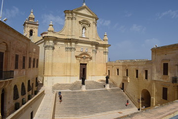Fototapeta premium RABAT, MALTA - August 2018: Traditional Maltese church architecture, old houses and narrow streets, Rabat, Mdina, Malta
