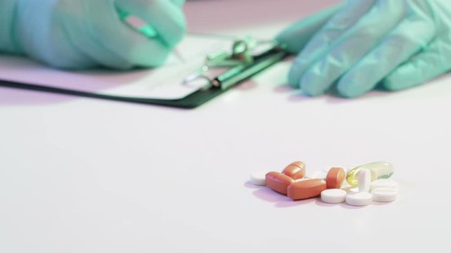 Coronavirus epidemic. Drug therapy. Doctor writing medical prescription.