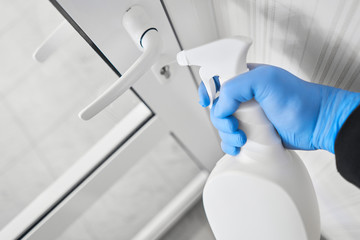 Disinfection, cleaning and washing of door handles. COVID-19. Prevention of coronavirus infection....