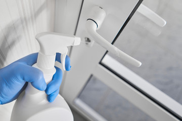 Disinfection, cleaning and washing of door handles. COVID-19. Prevention of coronavirus infection....