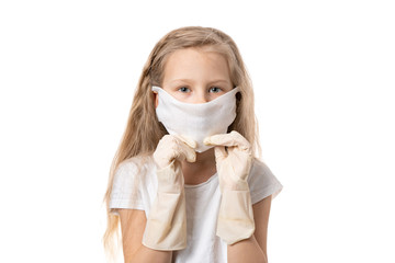 little girl covered her face with a mask for fear of a coronavirus