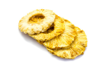 dried pineapple rings on white background