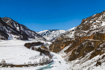 Top view of the frozen river Katun in winter, Altai Republic, Russia