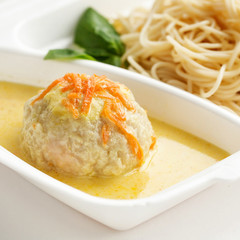 food delivery lunchbox. Meatballs in creamy sauce and pasta. Food to go.