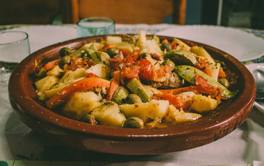 Close photo of an open tajine on a table