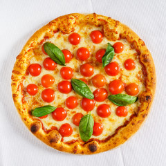 vegetarian pizza on the white, top view