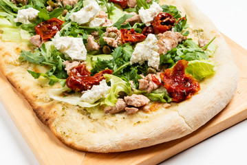 fresh pizza on the wooden tray
