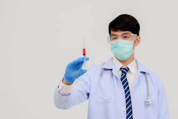 Fototapeta premium Technicians of vascular health in clinical laboratories for medical research and development concepts, medicine and science. Containing syringes and vaccines from vaccines, influenza, coronavirus, Cov