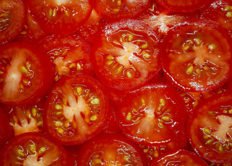 Background with tomatoes for salad and other dishes . 