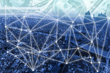Double exposure money on network connection and city background. Elements of this images furnished by nasa
