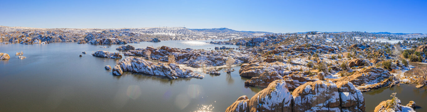 A panoramic winter image of Watson Lake in Prescott Arizona with the Granite Dells taken by a drone.