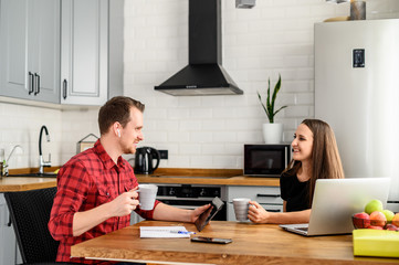 Young couple in love websurfing together