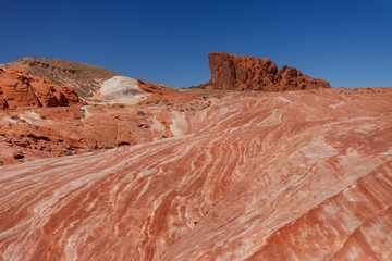 Surrounding landscapes of Fire wave during wonderful sunny day with blue sky, in Valley of Fire State Park, Nevada, USA