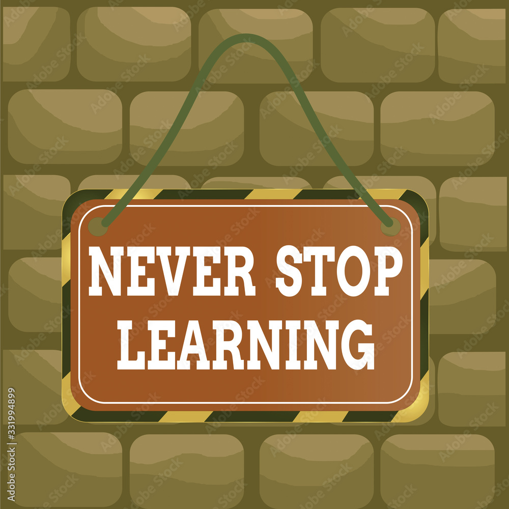 Poster handwriting text never stop learning. conceptual photo keep on studying gaining new knowledge or mat