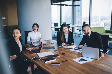 Business team sitting in conference room and coworking