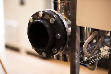 Fototapeta premium Flanges, nuts, bolts, tubes in industry concept