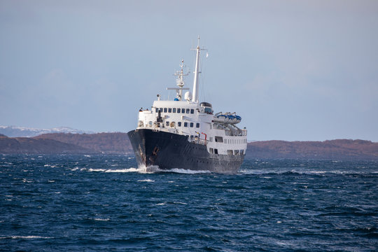 Old coastal passenger ship arrive at Brønnøysund harbor in Nordland county	