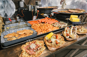 Some hot delicious fresh grilled street food in a vendor in the Citadella in Budapest Hungary