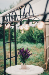 Beautiful bouquet of bright wildflowers with decorative elements