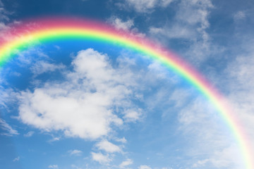 blue sky and rainbows background.