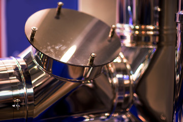 Flanges, nuts, bolts, tubes in industry concept