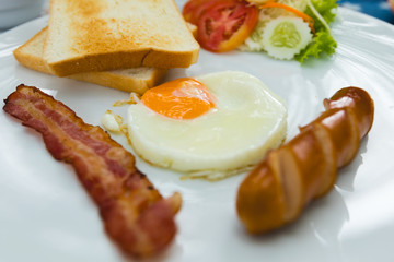 bacon and eggs in dish for breakfast