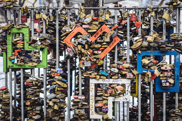 Some love locks on an iron cage on a street in Budapest Hungary