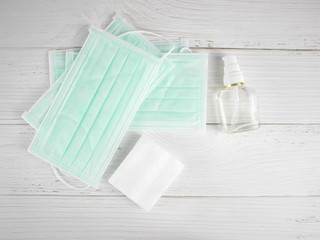 Alcohol gel Sanitary mask and white cotton.