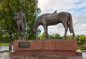 Monument to poet Konstantin Batyushkov on Vologda River Embankment in center of Vologda in summer, Vologda, Russia