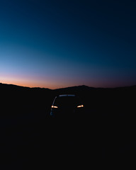 Fototapeta na wymiar silhouette of car at sunset