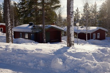 Typical wooden houses in Sweden during winter